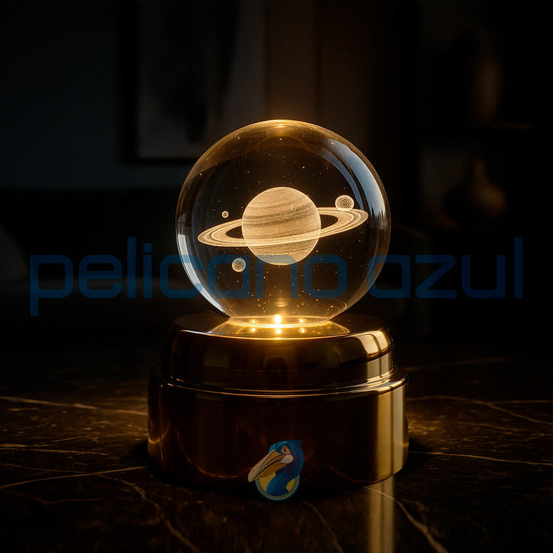 luminária giratória com planeta saturno iluminado em base dourada para decoracao moderna